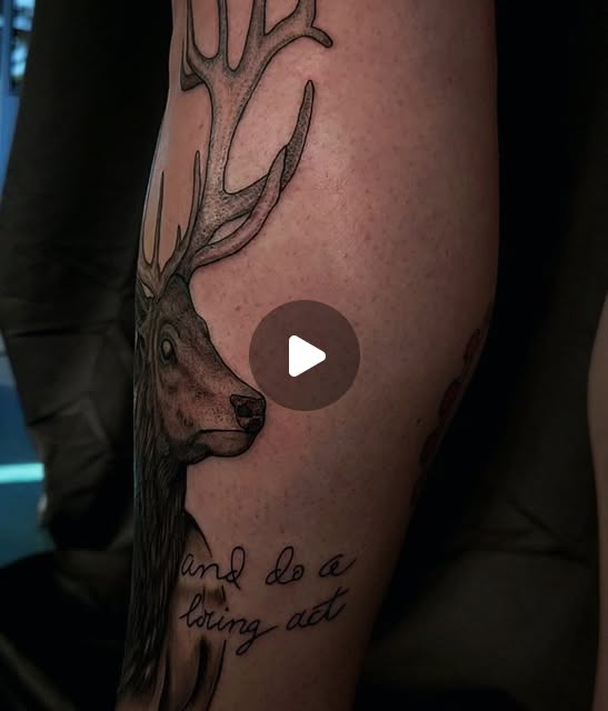 Stag with antlers and script
