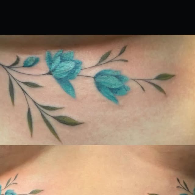 Teal flowers on a vine in color